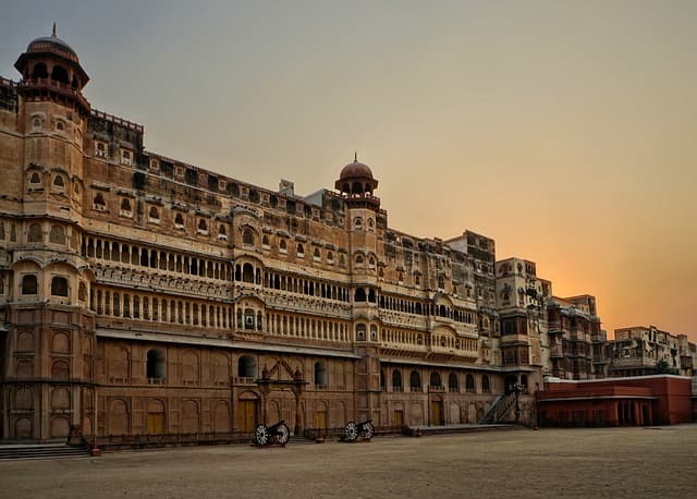 Historic fort architecture of Junagadh in Gujarat against a clear sky