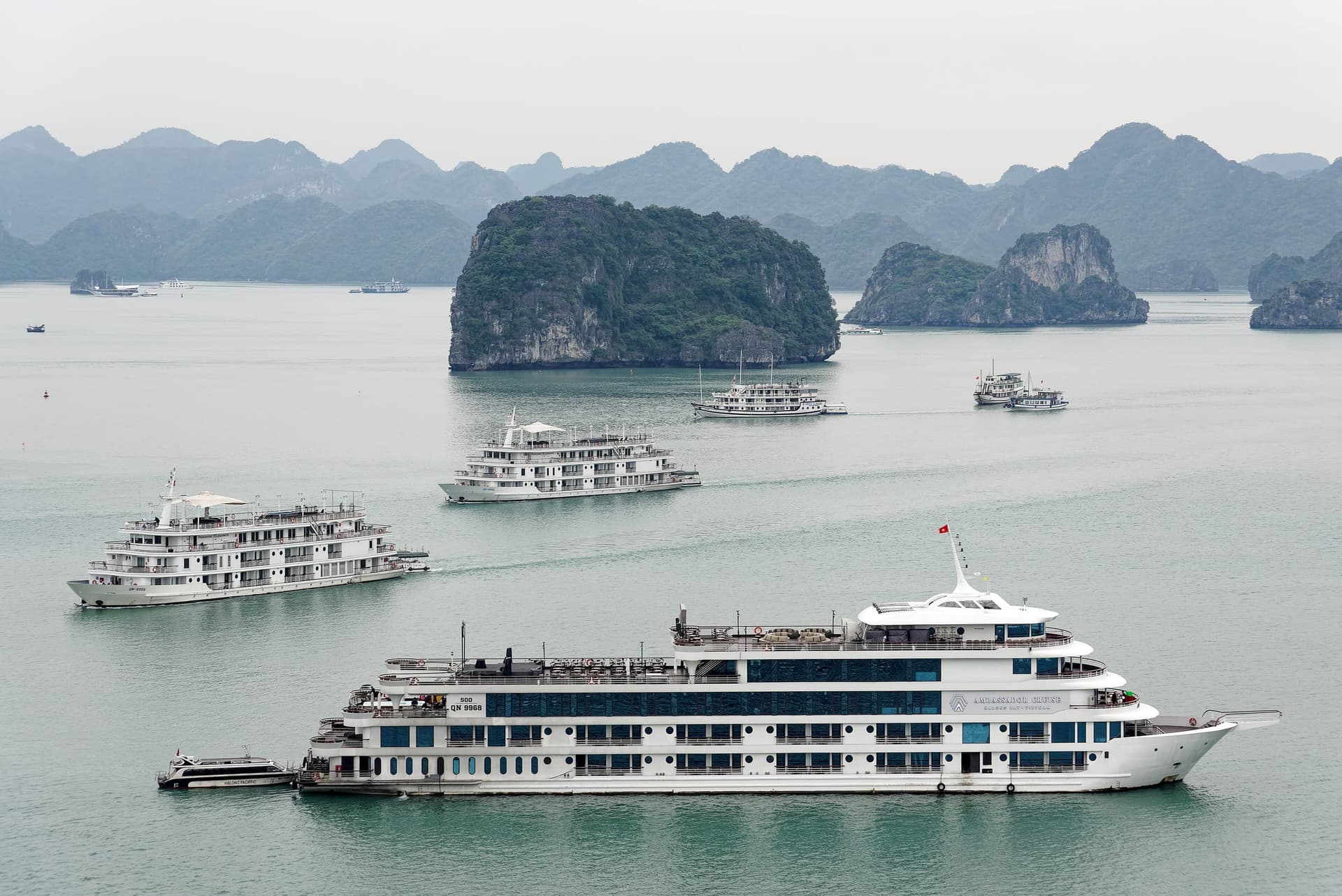Limestone karsts rising from the emerald water of Halong Bay